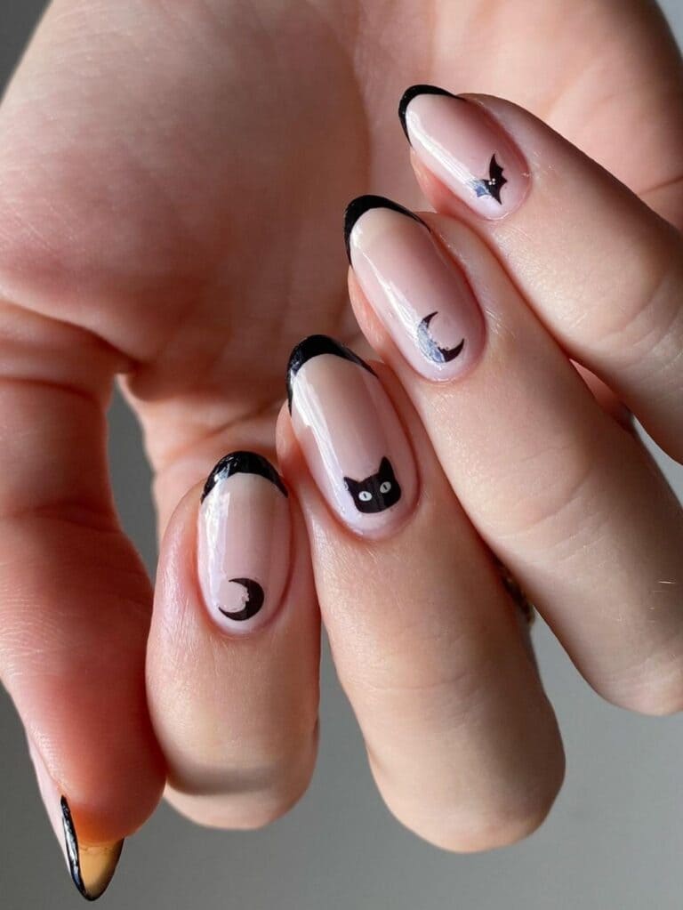 Simple black French manicure with Halloween elements