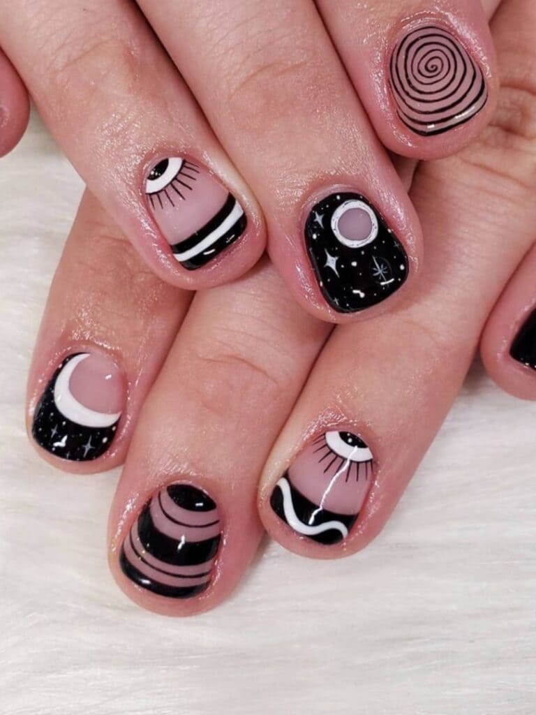 short black and white astrology nails 