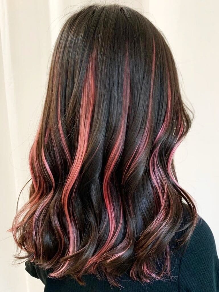 Pink Highlights for Wavy Hair