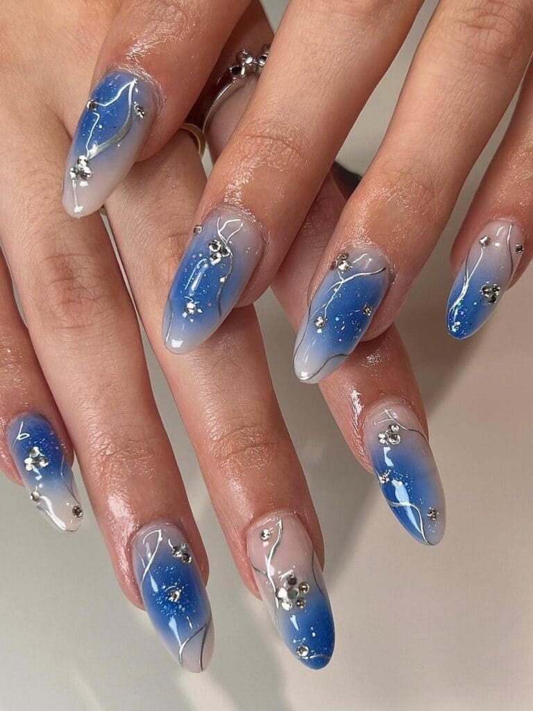 Blue Aura Nails with Chrome Embellishments