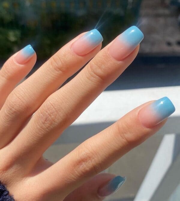 light blue gradient nails in a square shape