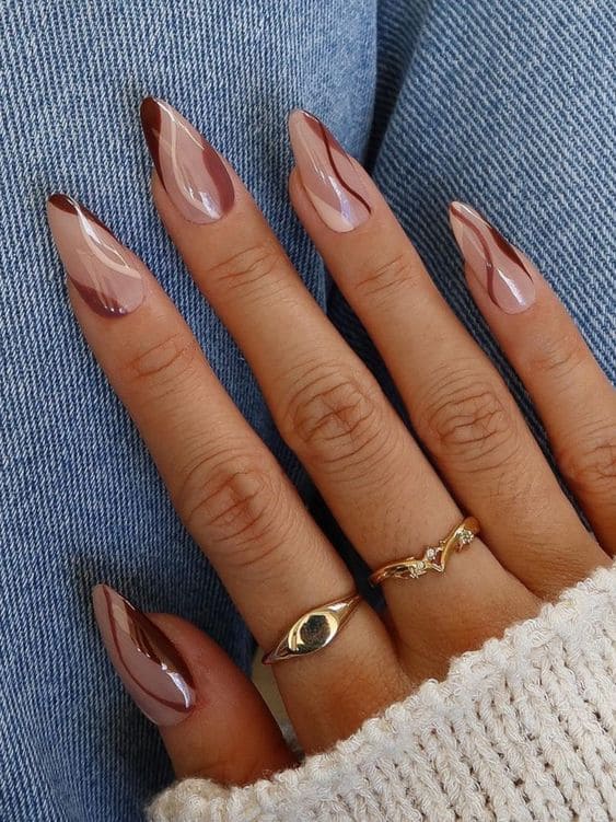 Brown and beige swirl nail designs