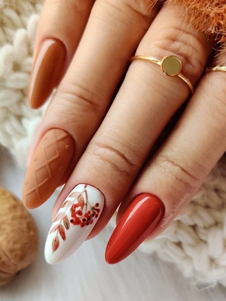 Dark orange and brown nails with fall leaves