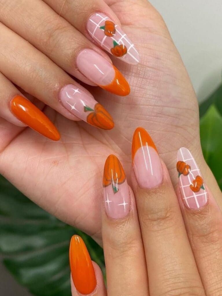 Orange French manicure with pumpkins