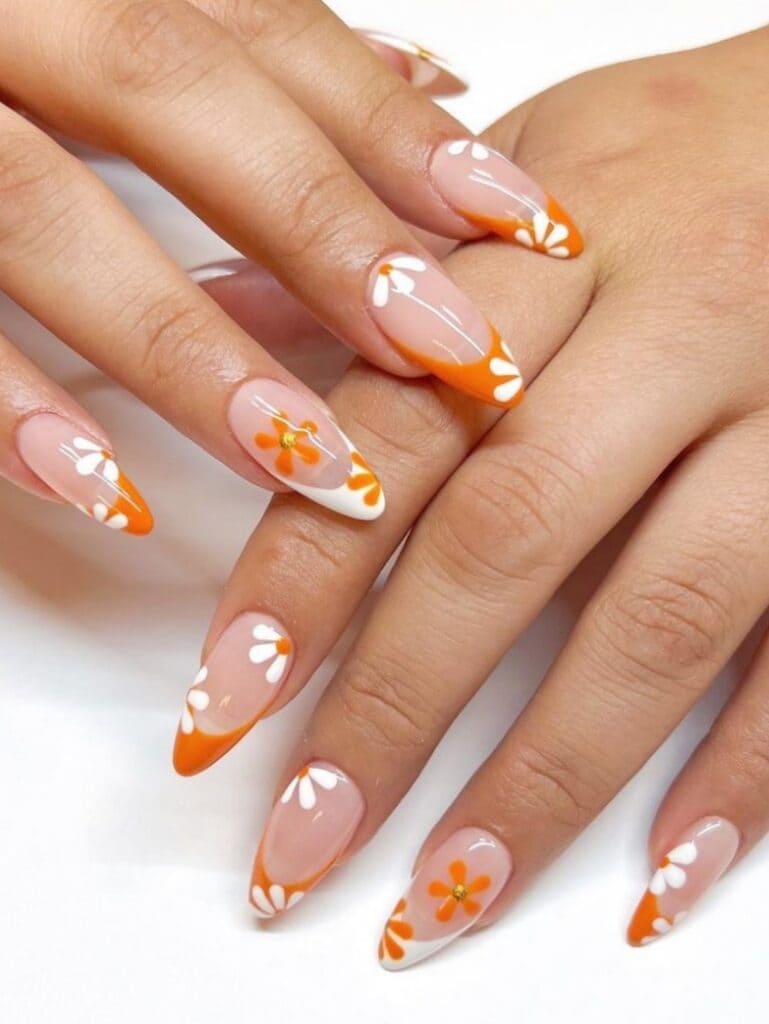 Burnt orange and white French manicure with flowers