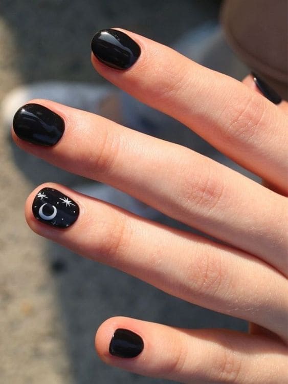 Short black nails with a moon accent