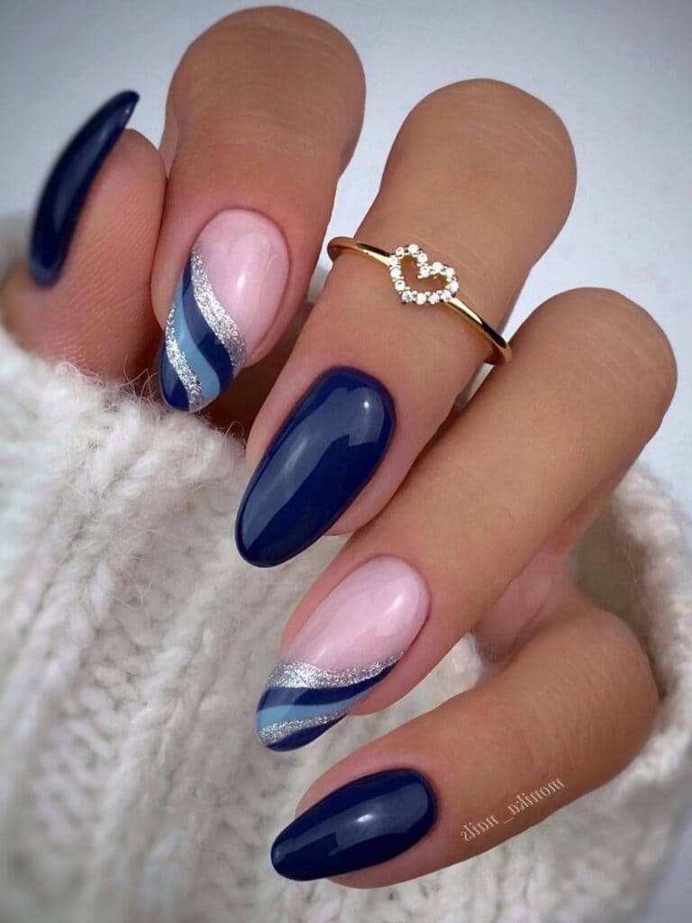Dark blue fall nails with swirl designs