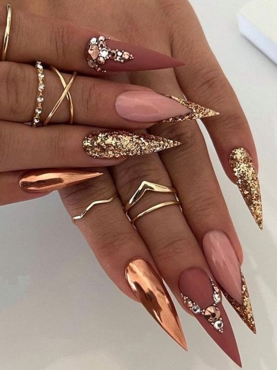 Brown and gold fall nail designs for long stilettos