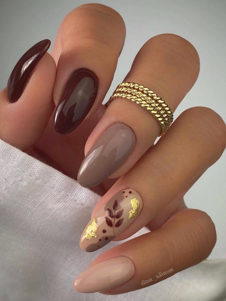 Shades of brown fall nails with leaf designs