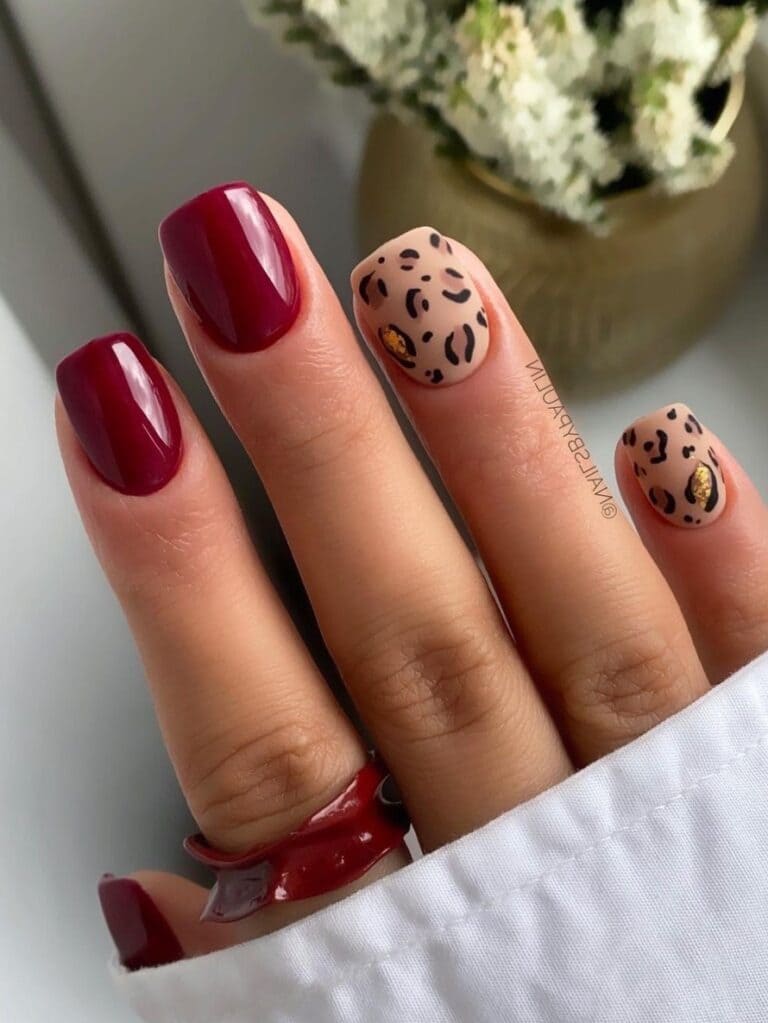 Short burgundy and leopard print fall nail designs