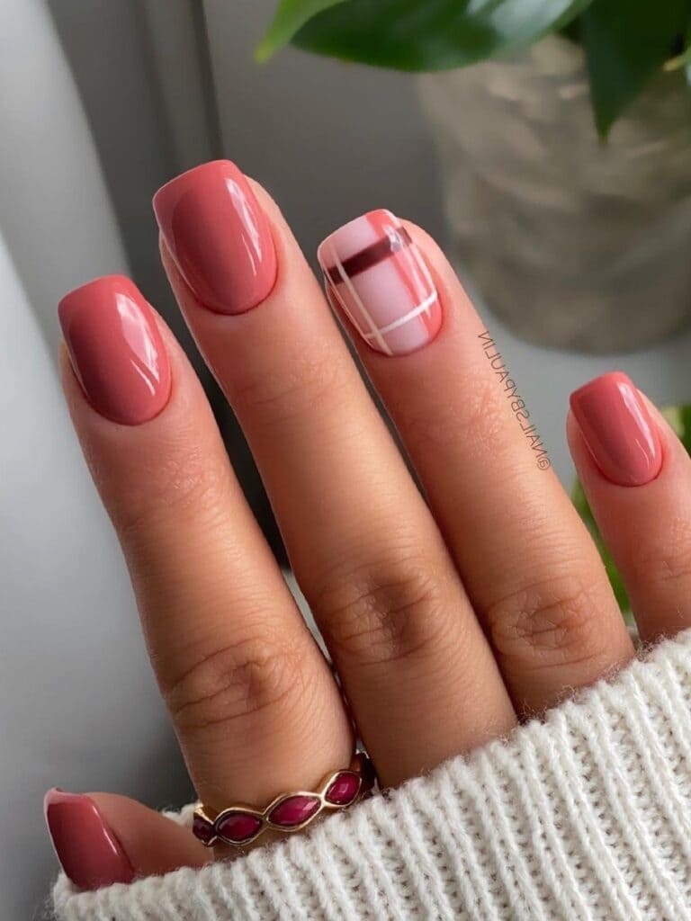 Dark pink and plaid fall nails