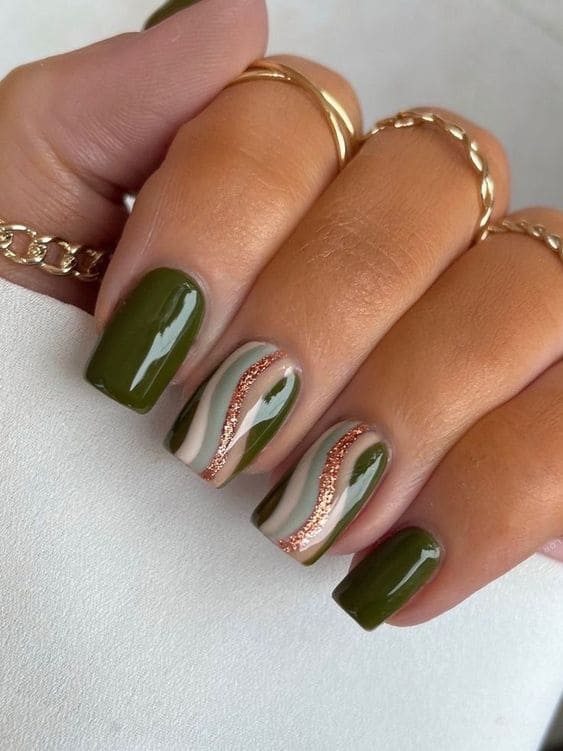 Olive green fall nails with swirl designs