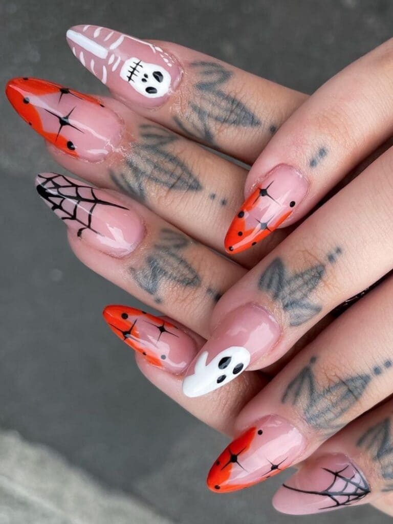 Orange and white astrology nail design