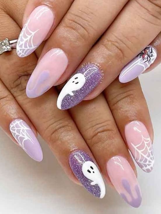 Pale pink and purple Halloween nails