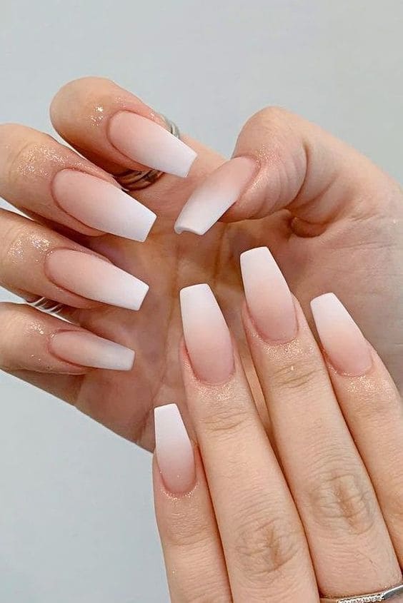 Long coffin shaped matte nude and white gradient nails