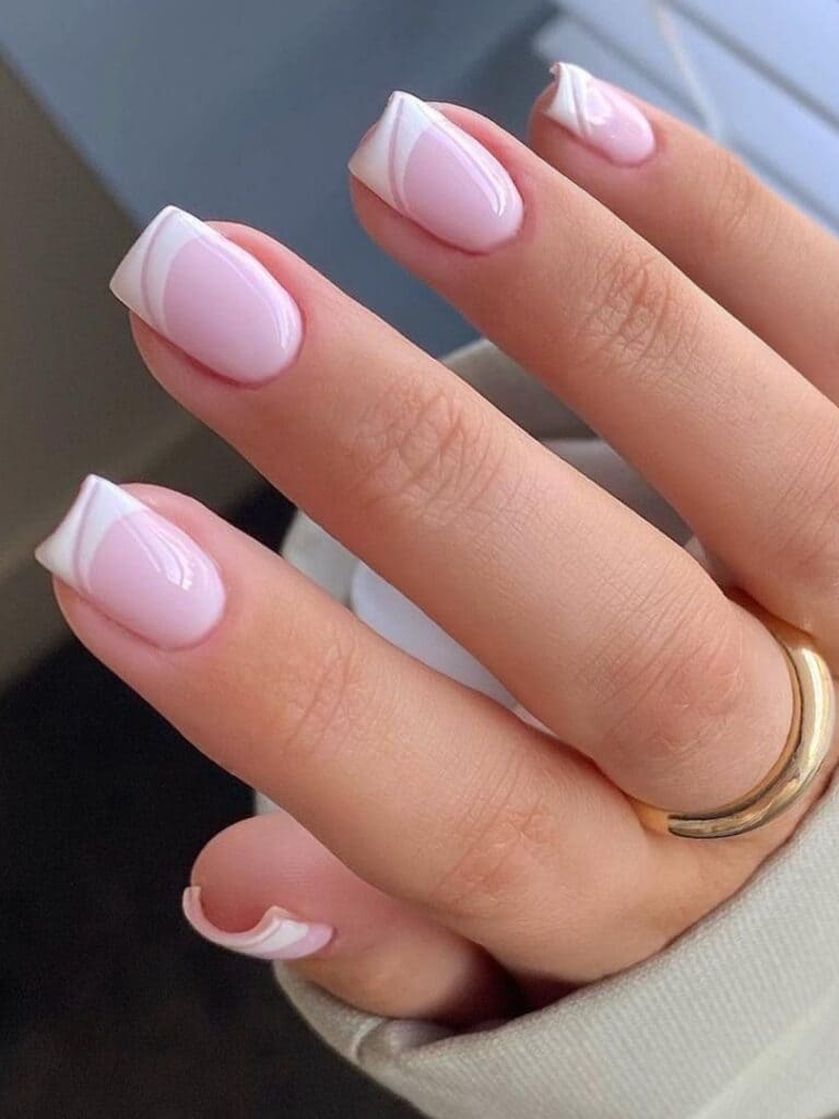 Pale pink nails with white French tips
