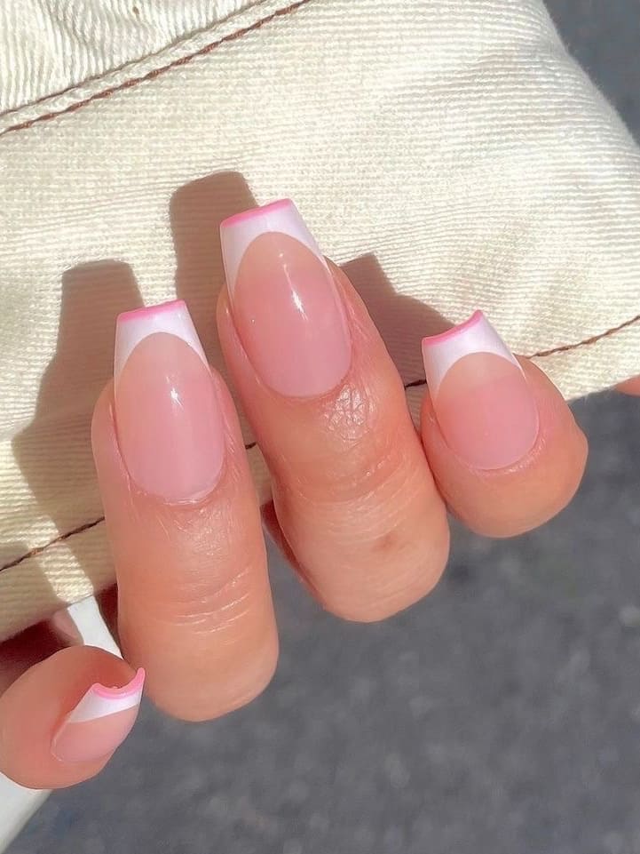 Coffin-shaped white and pink French tips