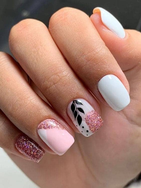 Pink and white short nails with glitter and leaves