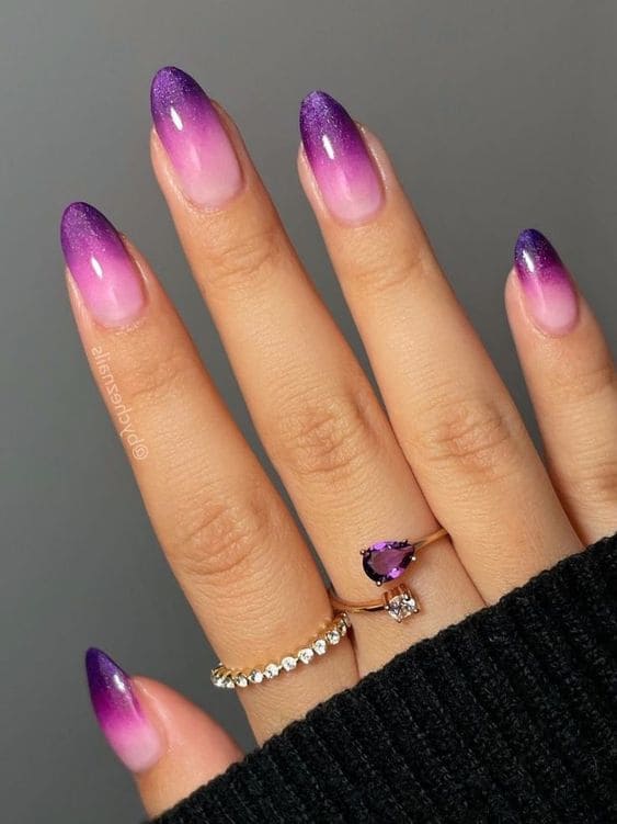 Shimmery, dark purple ombre nails