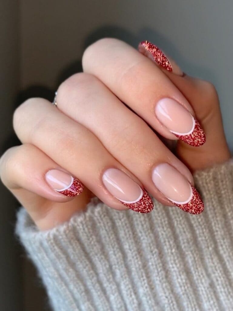 Glittery red French tip nails
