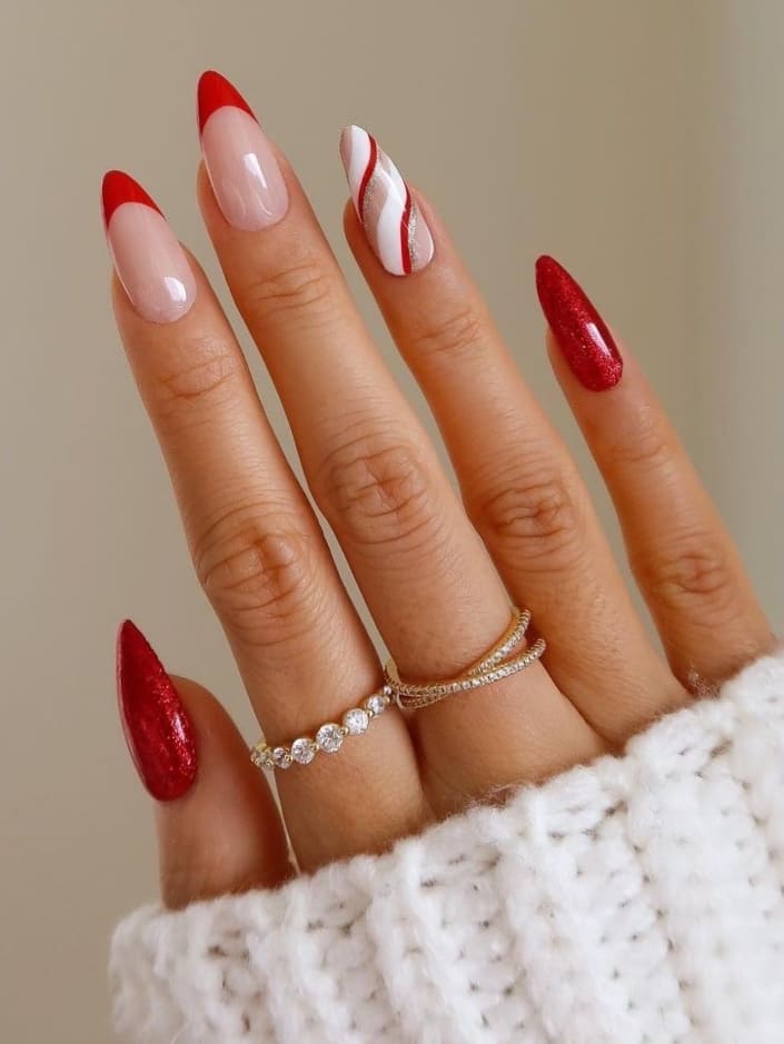 Almond-shaped, red French tips with stripes