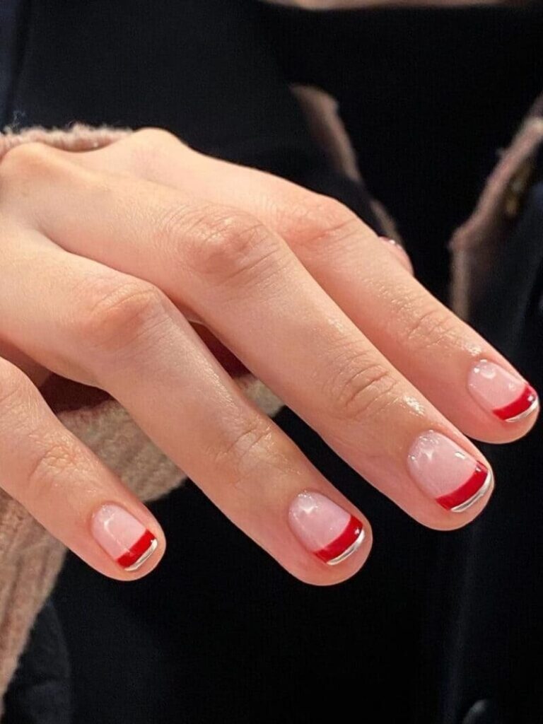 Red and gold double French tip nails