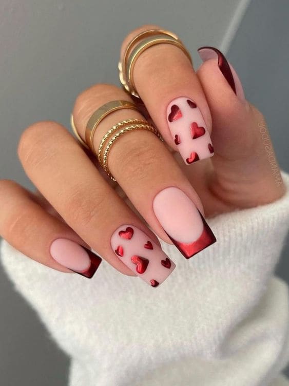 Velvety red French manicure with hearts