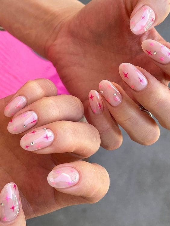 Milky white nails with pink sparkles