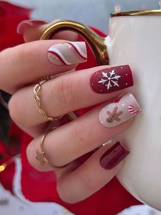 burgundy and nude nails with Christmas elements