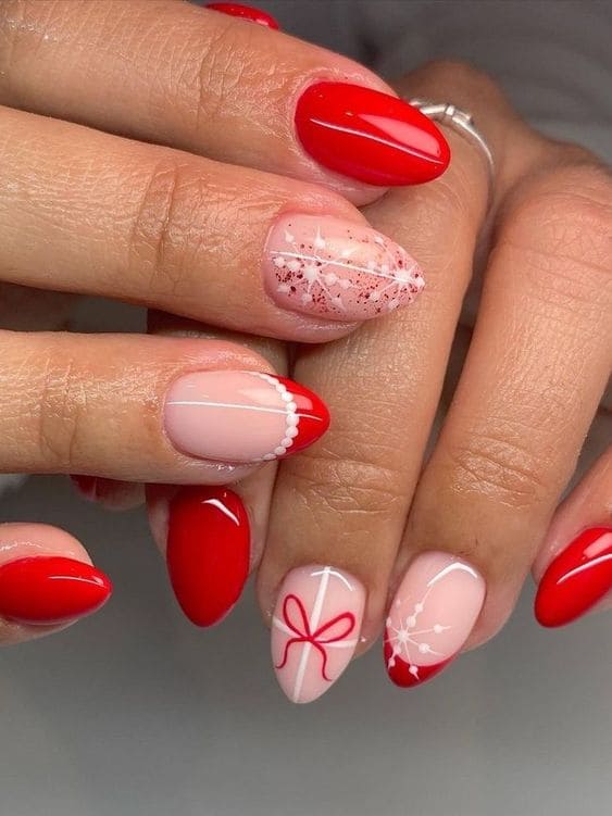 Short, almond-shaped, Christmas acrylic nails in red