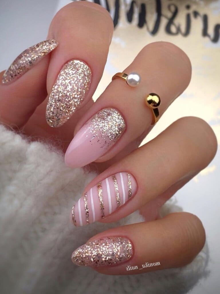 Gold glitter and pink Christmas nails