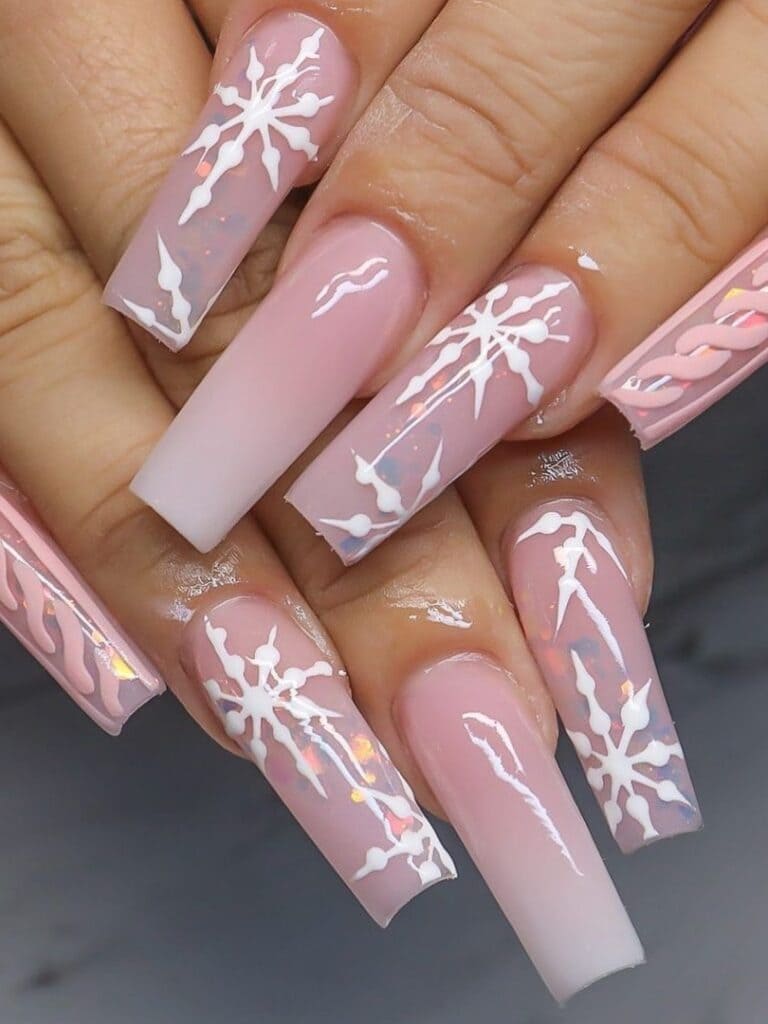Long acrylic in pale pink with snowflakes