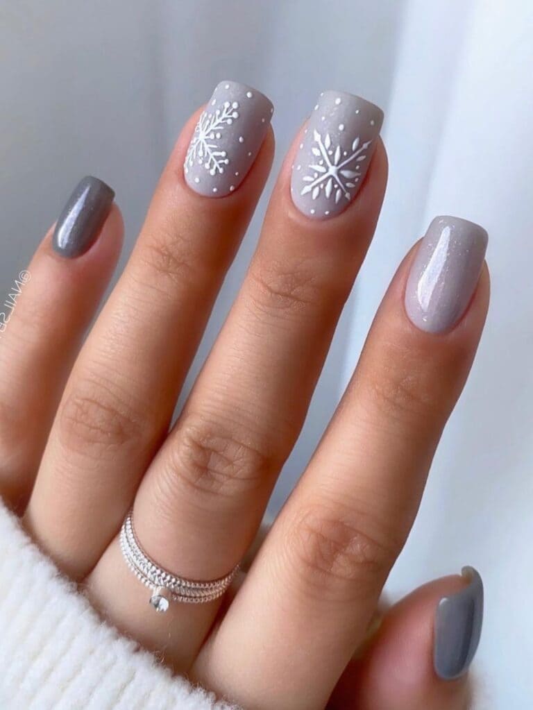 Snowflakes on gray short nails 