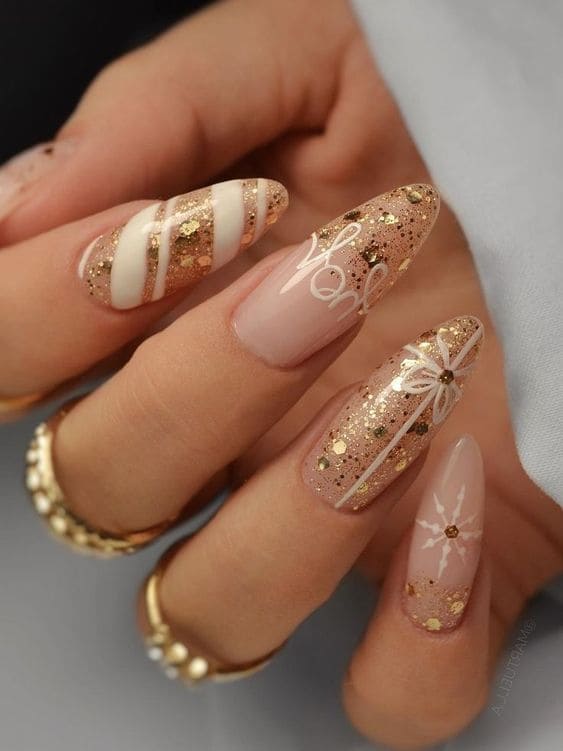 Mix-and-match Christmas acrylic nails in gold glitter