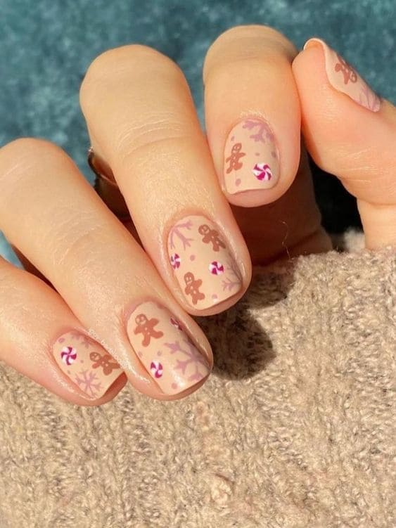 Gingerbread man and candy canes on short nails