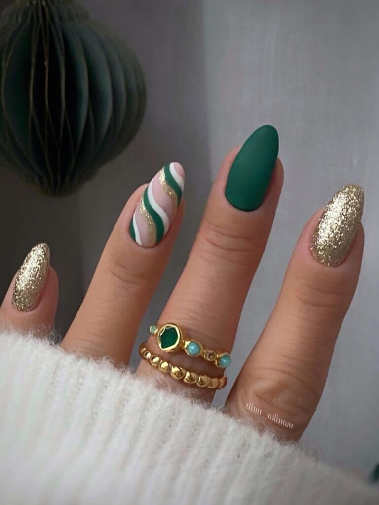 Matte green and gold nails with stripes 