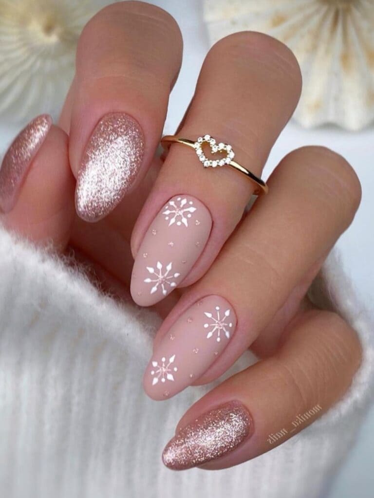 Nude and glitter nails with snowflakes