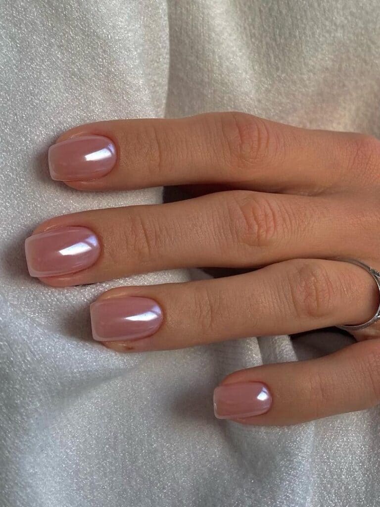 Short, clear, and glossy pearl nails