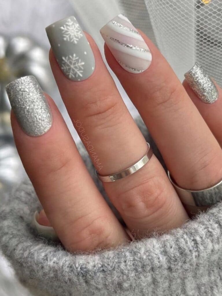Short, light gray winter nail design