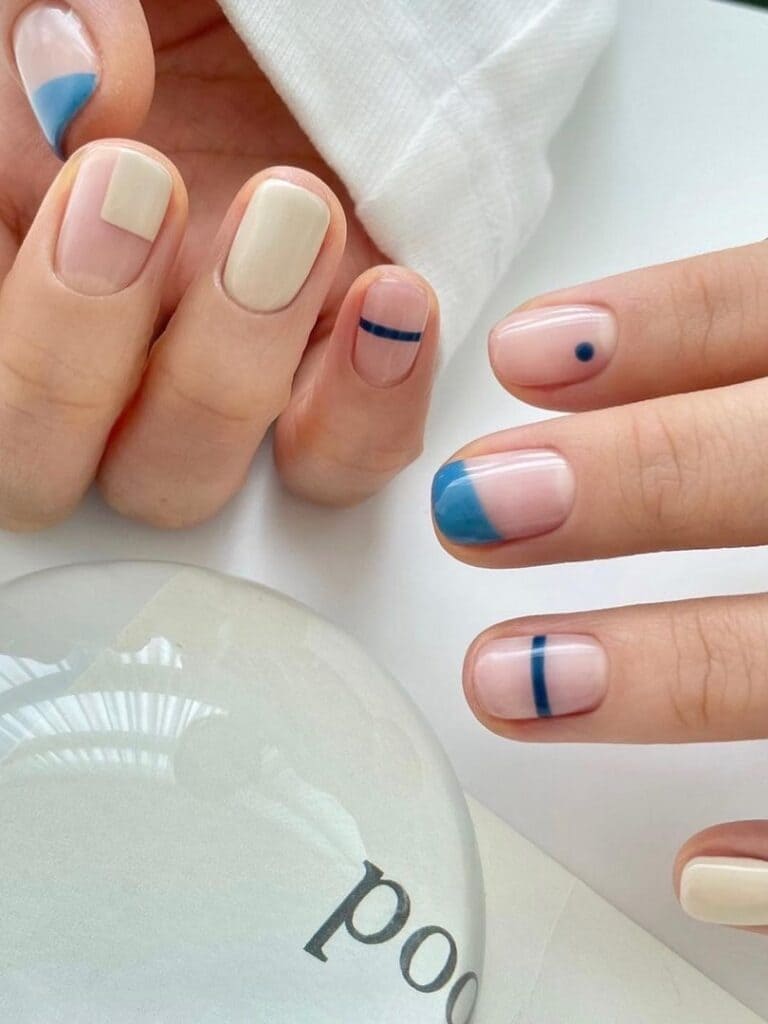Blue and ivory negative space nails 