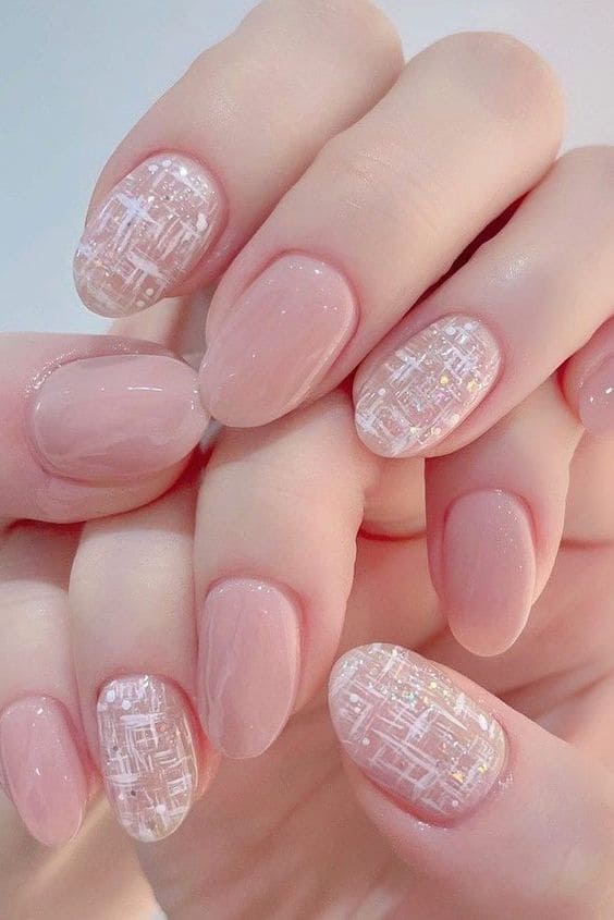 Shimmery nude and tweed-textured nails