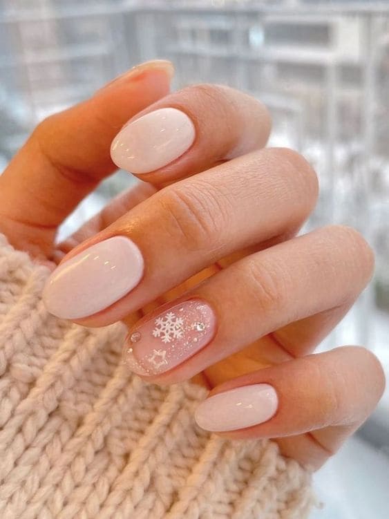 White nails with snowflake accents
