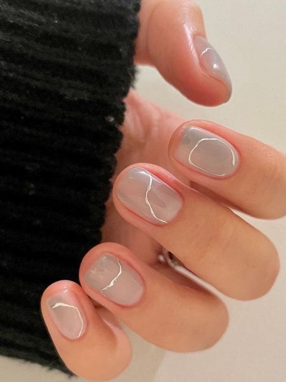 Short gray nails with silver lines
