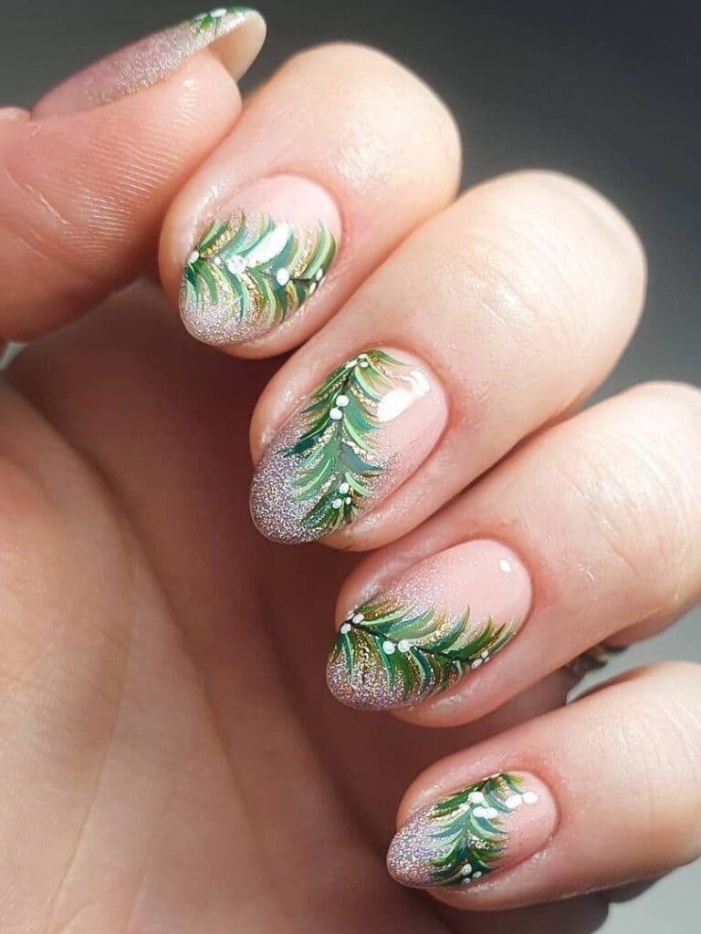 Silver ombre glitter nails with a Christmas wreath 