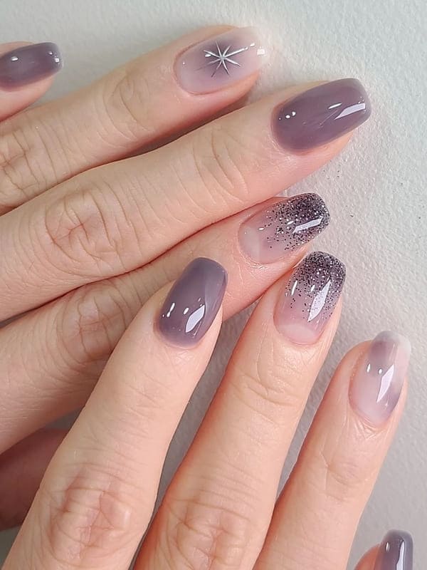 gray jelly nails with chrome sparkles