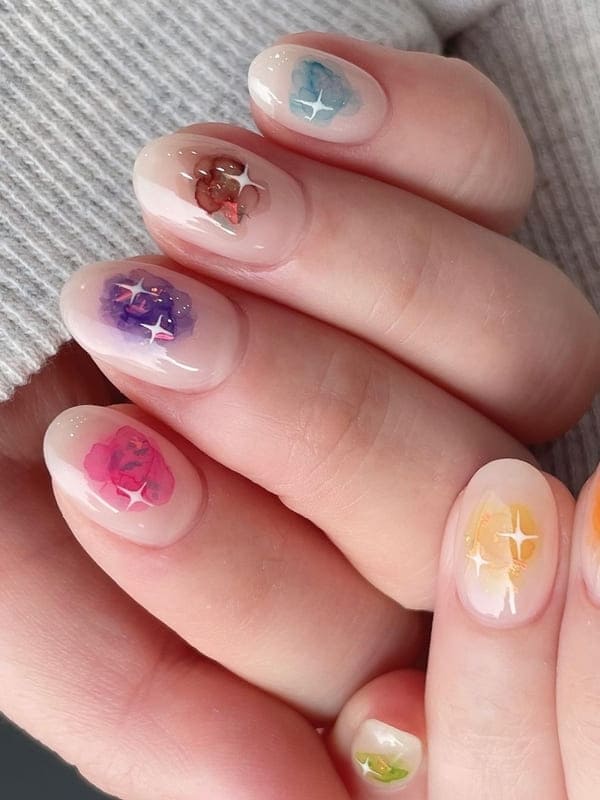 vibrant multi color cheek nail designs