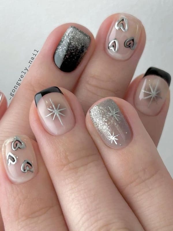black cheek nails with chrome art