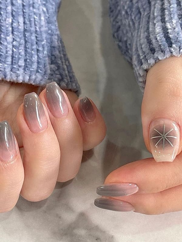 light gray ombre nails with chrome sparkles 