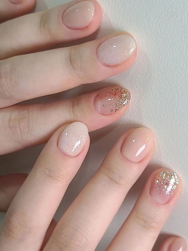 nude Korean jelly nail with gold glitter