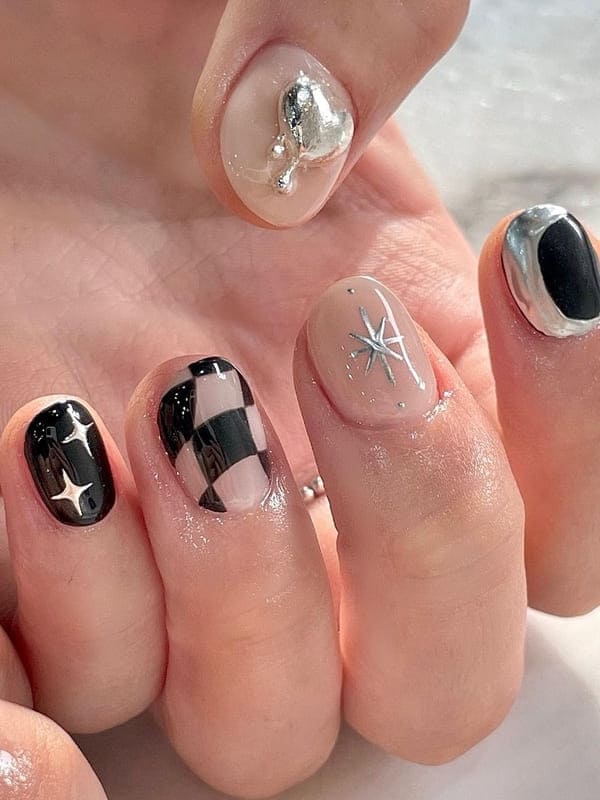 black and white indie nails with chrome art 